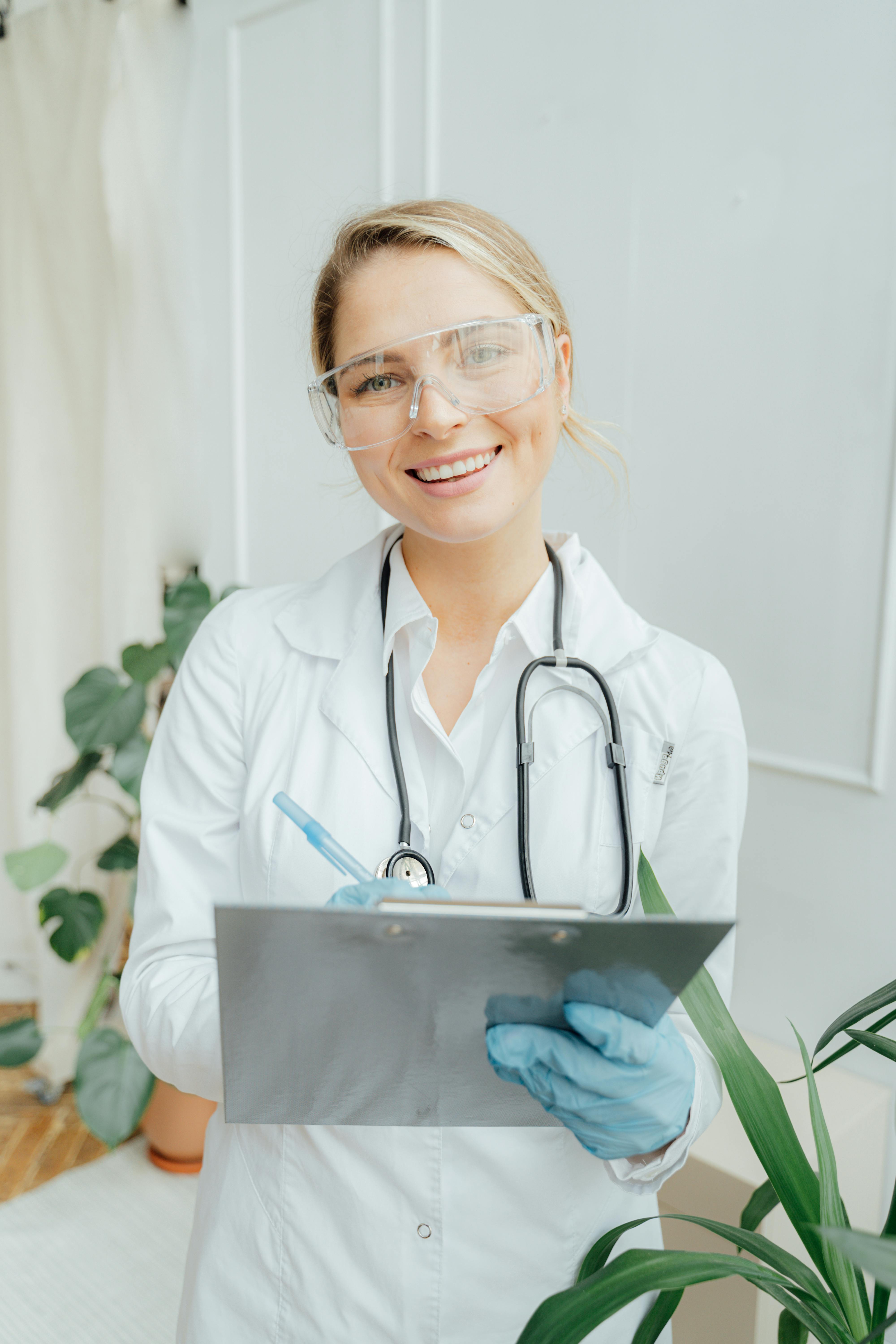 Doctor holding medical documentation clipboard
